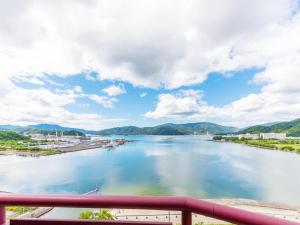 a view of a river from a bridge at Hotel BELLMARE ホテルベルマーレ in Maizuru