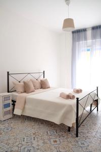 Postel nebo postele na pokoji v ubytování NERI Rooms