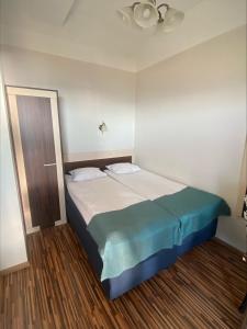 Postel nebo postele na pokoji v ubytování Pirita Beach Apartments & SPA