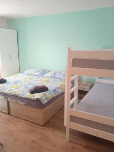 Postel nebo postele na pokoji v ubytování Apartmán LauMar 3