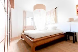 Posteľ alebo postele v izbe v ubytovaní Exclusive apt with stunning patio in the center