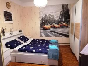 Posteľ alebo postele v izbe v ubytovaní Hortenzia apartman