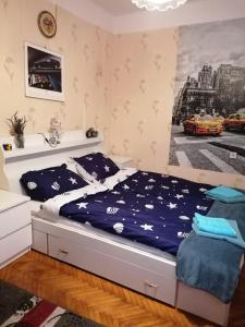 Posteľ alebo postele v izbe v ubytovaní Hortenzia apartman