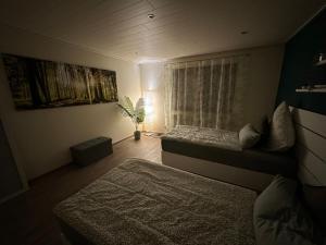 Letto o letti in una camera di Bähnleblick Blumberg