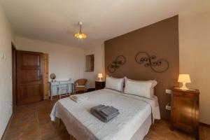 Letto o letti in una camera di San Leo Albergo Diffuso