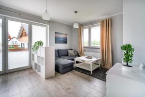 Posedenie v ubytovaní Apartamenty Eksploris II