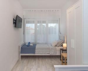 Una cama o camas en una habitación de Apartman Scala