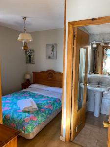Postel nebo postele na pokoji v ubytování Apartamento con vistas a pistas, en Formigal.