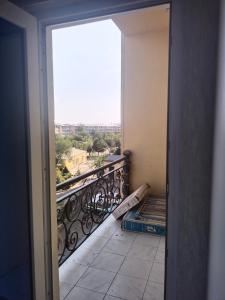 an open door to a balcony with a view at Элит 5 in Khujand