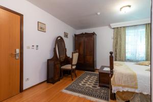 Katil atau katil-katil dalam bilik di Heritage Hotel Pasike