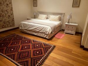 Postel nebo postele na pokoji v ubytování iDube Lodge Walkersons