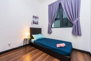 Uma cama ou camas num quarto em Simfoni Tower 3R2B 8pax @C180@Chr Trader Square