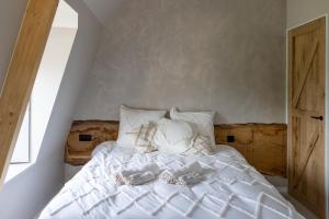 Katil atau katil-katil dalam bilik di 't Hooiland