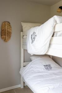 Cama o camas de una habitación en 't Hooiland
