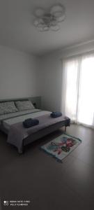 Postel nebo postele na pokoji v ubytování Villa Flamingo B&B