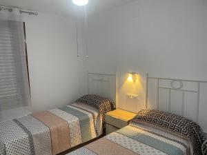 Postel nebo postele na pokoji v ubytování VILLA MARIBEL