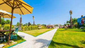 Fotografie z fotogalerie ubytování Toscana Garden Bungalow v destinaci Ildır + 12 fotografií