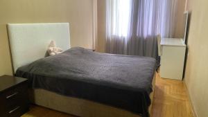 Postel nebo postele na pokoji v ubytování Gocha's apartaments