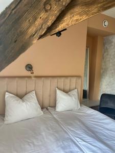 Postel nebo postele na pokoji v ubytování Hotel Rezidence Wannas Self Check in