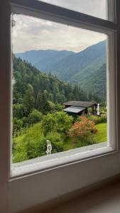 a window with a view of a mountain view at B&B22 in Santa Brigida