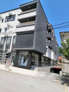 a building on the side of a street at City Center Condo Vranje in Vranje