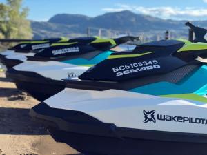 a row of kayaks lined up in a row at Spirit Ridge, in The Unbound Collection by Hyatt in Osoyoos