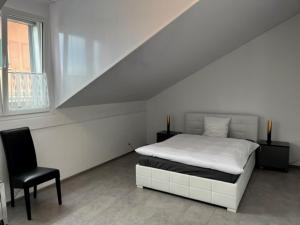 Postel nebo postele na pokoji v ubytování Hotel Hippel Krone
