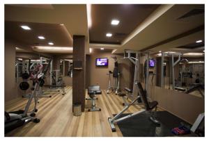a gym with several treadmills and cardio machines at Aparthotel Regina Mare in Tsarevo