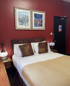 Ένα ή περισσότερα κρεβάτια σε δωμάτιο στο Cappadocia Guest House