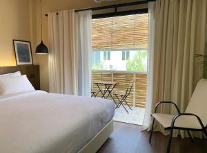 Voodi või voodid majutusasutuse Suncloud Hotel Koh Samet toas