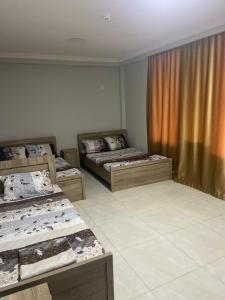 Postel nebo postele na pokoji v ubytování Hotel Mia