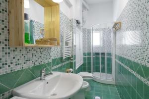 Ванна кімната в Casa Tua a Monti