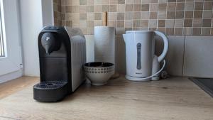 Coffee and tea making facilities at Virágos Apartman Balatonszemes