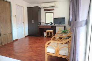 TV a/nebo společenská místnost v ubytování Sunshine Guest House