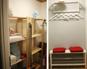 Habitación con armario con estanterías y toallas en Ferienwohnung Mohnbrise, en Germerode