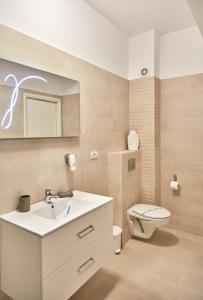 Ванная комната в Excelsior Apartaments Mamaia Nord