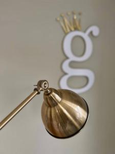 a close up of a gold object in front of a number at Inn Glastonbury - Self Catering in Glastonbury