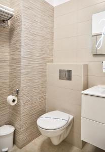 Ванная комната в Excelsior Apartaments Mamaia Nord