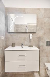 Ванная комната в Excelsior Apartaments Mamaia Nord