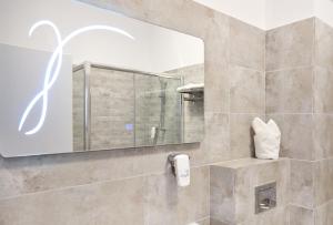 Ванная комната в Excelsior Apartaments Mamaia Nord