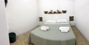 Postel nebo postele na pokoji v ubytování Settegrana Suite con vasca idromassaggio