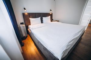 Letto o letti in una camera di Avalon Hotel&Pool