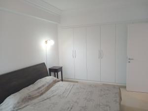 Postel nebo postele na pokoji v ubytování Beau Site