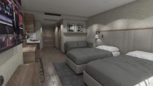 a rendering of a hotel room with two beds and a tv w obiekcie SEA TOWN RESIDENCE TRABZON w mieście Yomra