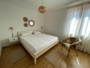Postel nebo postele na pokoji v ubytování Apartman Stenice