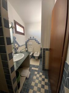 Koupelna v ubytování B&B La Pitraia