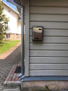 a mail box on the side of a house at LOSSI 21/23 in Tartu