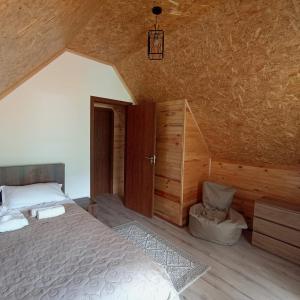 Кровать или кровати в номере Mountain flower cottage