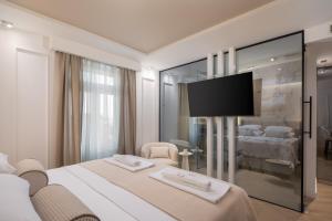 Luxury rooms Le Prestige Few Minutes from Split's Iconic Waterfront客房内的一张或多张床位
