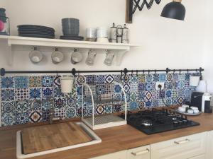 A kitchen or kitchenette at RIFUGIO Salentro